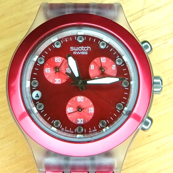 X Swatch Irony Diaphane Ruby red bezel and dial 3 hand movement date 43mm - Picture 2 of 9